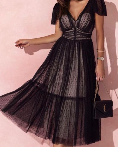 Zwarte galajurk met stippen en V-hals - Mirella