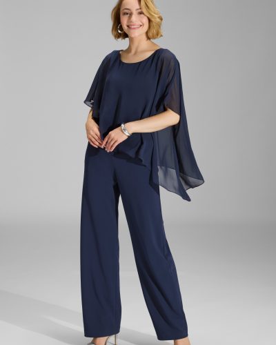 Swing navy blauwe jumpsuit van crêpe jersey met chiffon overlay - bestel bij BK Leder Swing navy blauwe jumpsuit van crêpe jersey met chiffon overlay